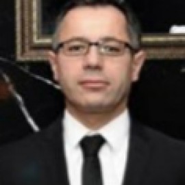Ünal Koç