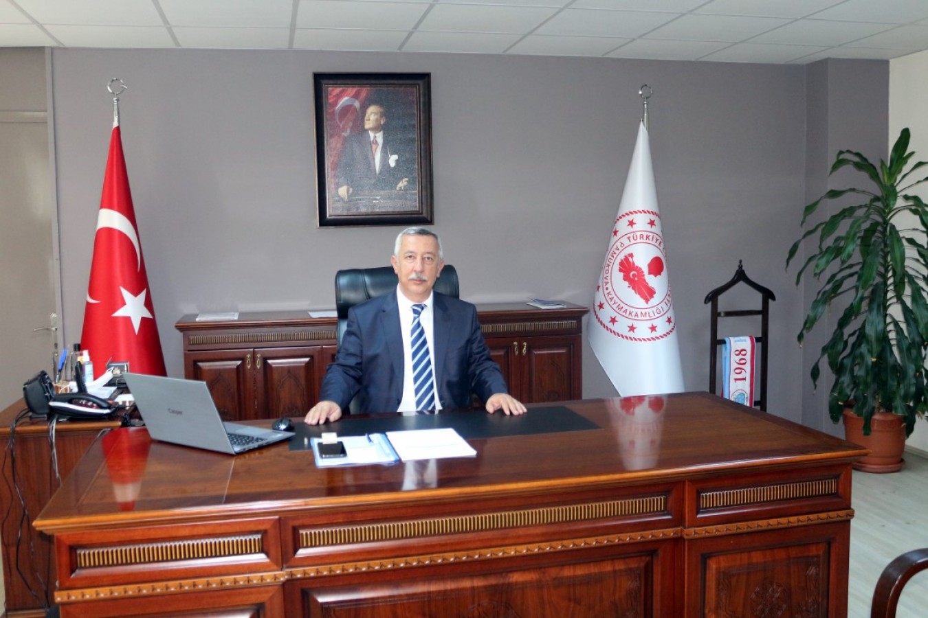 Mustafa ÜNLÜSOY;