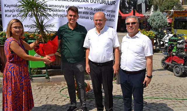 Kaymakam Köken'den örnek davranış: Hayırlı olsun çiçekleri öğrencilere destek oldu;